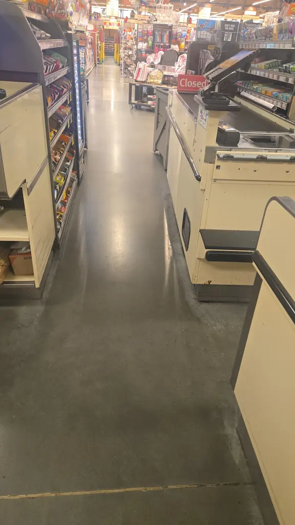 Checkout lanes cleaned after hours at a grocery store