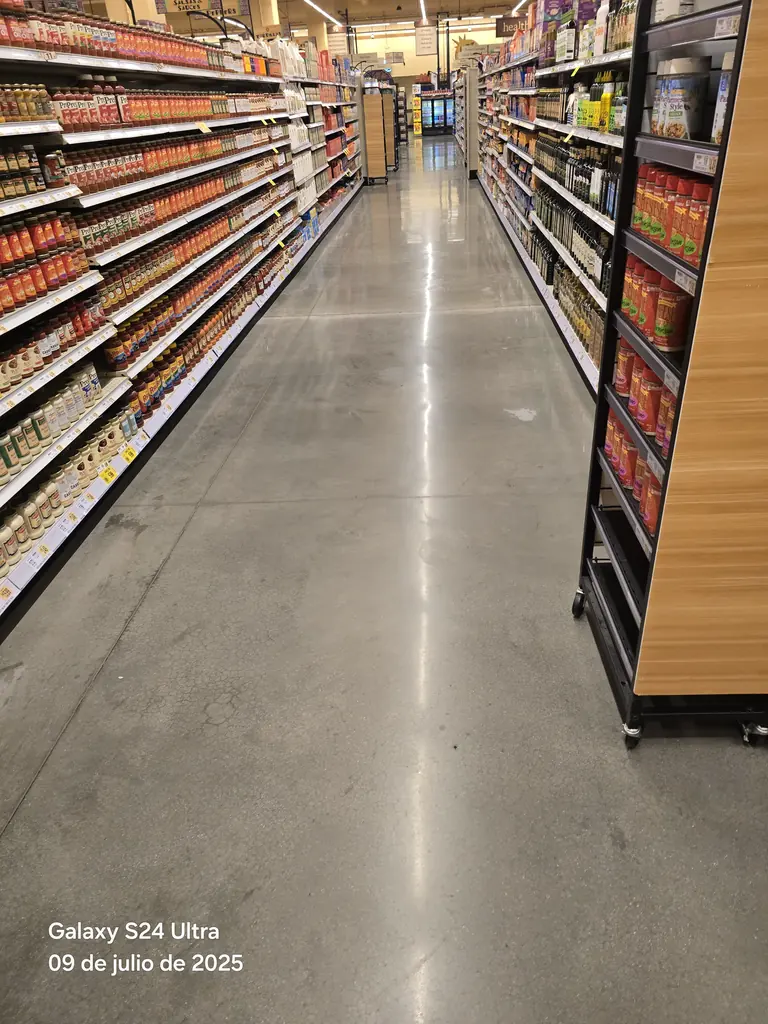 Grocery aisle polished concrete after an overnight cleaning shift