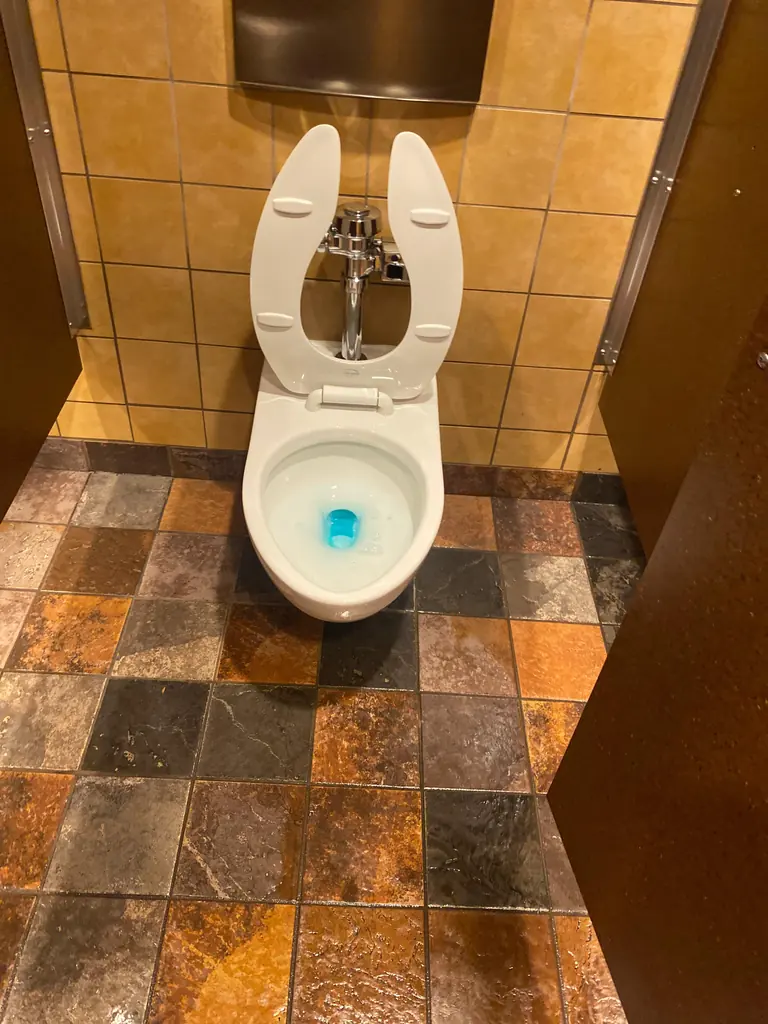 Commercial restroom and stone tile floor cleaned on a nightly schedule