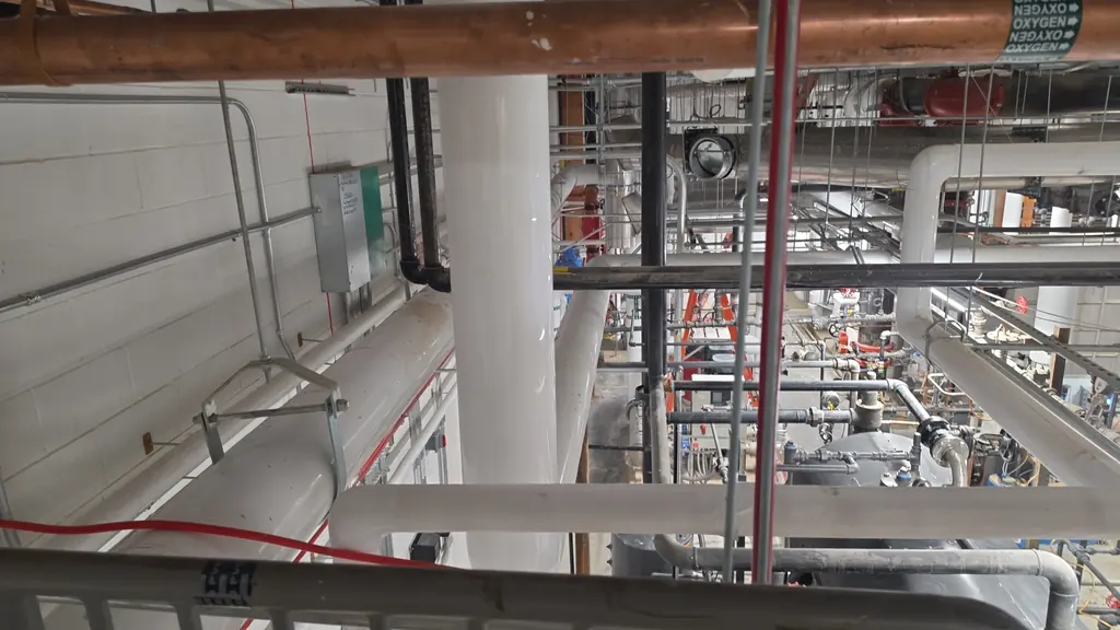 Mechanical mezzanine cleaned before handover on a new commercial build