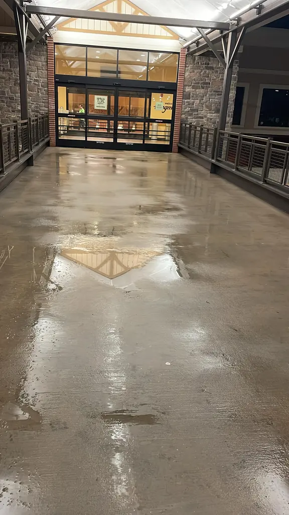 Covered commercial walkway washed overnight